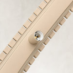 Neutral slatted ring chandelier, 31-inch holder and slatted rim.