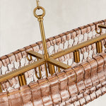 Linear amber glass chandelier detail.