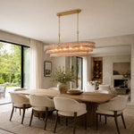 Linear amber glass chandelier room scene.