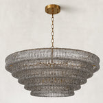 Unlit smoke-glass chandelier with canopy and chain.