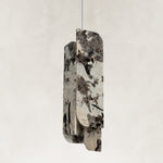 Product detail of Smoky Four-Panel Marble Pendant against a neutral background