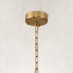 Single-tier panel chandelier, brass-tone canopy and chain.