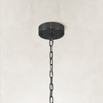 Single-tier panel chandelier, black canopy and chain.