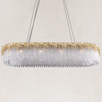 Gold-finish rectangular chandelier with a fringe of textured crystal glass