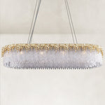 Gold-finish rectangular chandelier with a fringe of textured crystal glass