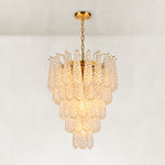 Clear textured glass cascade chandelier with Brass-finish hardware, shown as a complete fixture