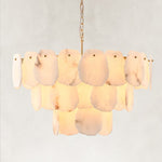 Illuminated three-tier scalloped alabaster chandelier with brass-finish fittings