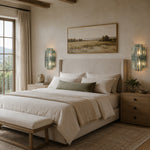 Tiered Marble-Composite Panel Wall Sconce installed beside a bed in a furnished bedroom