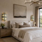 Tiered Marble-Composite Panel Wall Sconce displayed in a bedroom interior