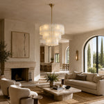Tiered Marble Drum Pendant displayed in a furnished living room