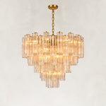 Illuminated tiered tubular glass chandelier with a round canopy