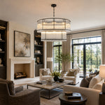 Black two-tier fluted glass chandelier in a room.