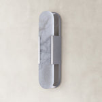 polished-nickel-tone elongated panel wall sconce unlit.