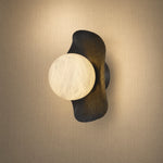 Eclipse Orb Radial Sunburst Alabaster Wall Sconce by Dalmivik, complete fixture view