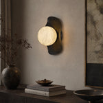Eclipse Orb Radial Sunburst Alabaster Wall Sconce by Dalmivik, product or room detail view