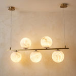 Brass 5-orb Linear Alabaster Pendant Light by Dalmivik, complete fixture view