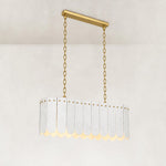 Scalloped Marble Linear Pendant 47.2" in Gold metal finish, shown as a complete fixture