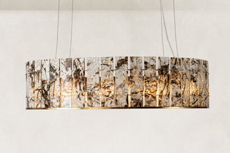 Cream veined stone-panel drum chandelier shown in full against a neutral background