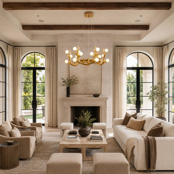 Illuminated sculptural chandelier centered over a neutral living room seating area