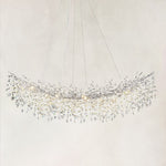Silver-finish crystal branch linear chandelier with the complete fixture visible