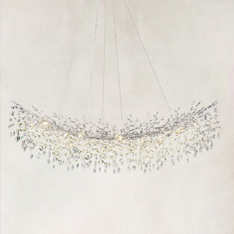 Silver-finish crystal branch linear chandelier with the complete fixture visible