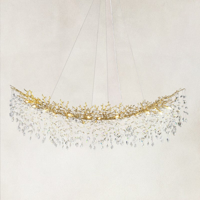 Brass-finish crystal branch linear chandelier with the complete fixture visible