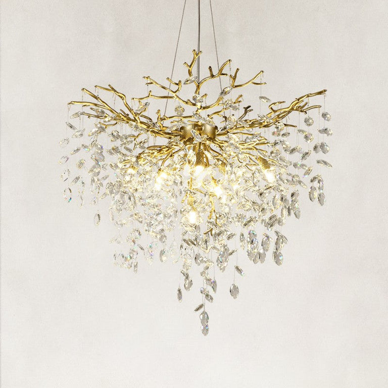 Brass-finish deep crystal branch cascade chandelier with the complete fixture visible