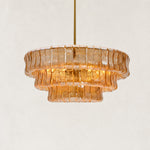 Textured glass round chandelier with lacquered burnished brass hardware