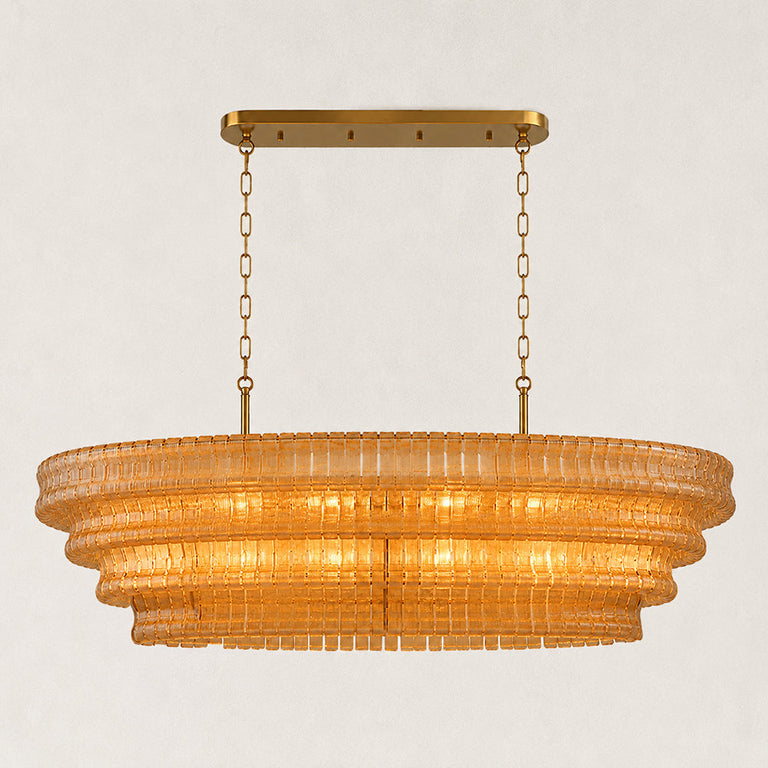 Amber fluted glass linear chandelier with stepped tiers