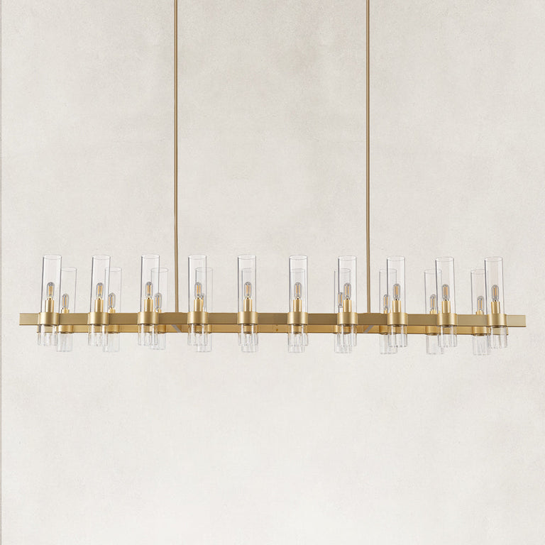 Brass-finish clear glass tube linear chandelier with the complete fixture visible