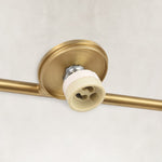 Adjustable Triple Cylinder Picture Light in Natural Brass - material detail