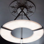 Alabaster Halo Pendant Light – Black & White LED Chandelier by Dalmivik, product or room detail view