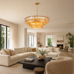 Amber round chandelier above a dark coffee table.