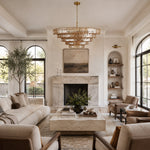 Amber tiered-glass chandelier in an fireplace living room.