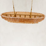 Amber glass linear chandelier viewed from above.
