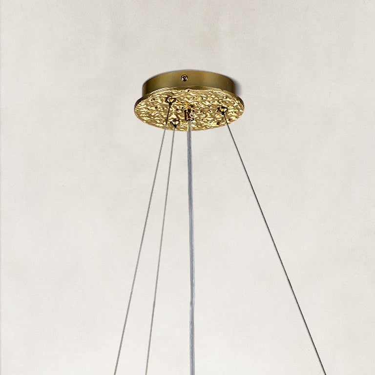 brass-tone deep crystal-branch chandelier canopy detail.