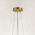 brass-tone crystal-branch chandelier ceiling canopy detail.