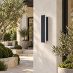 Black slim wall sconce exterior daytime scene