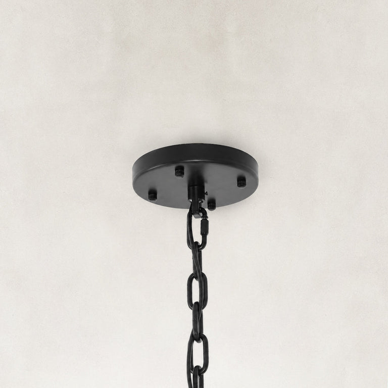Black chandelier ceiling canopy and hanging chain close view