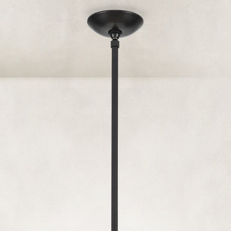 Black chandelier ceiling canopy and stem close view