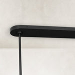 Black chandelier ceiling canopy and suspension rod close view