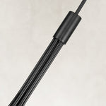 Black chandelier central sleeve and rod bundle close view