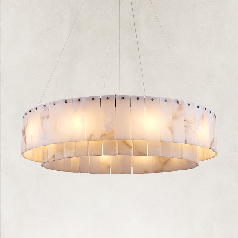 Illuminated layered alabaster ring chandelier with black hardware.