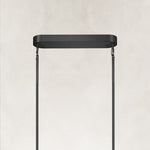 Black oval chandelier ceiling canopy and suspension close view
