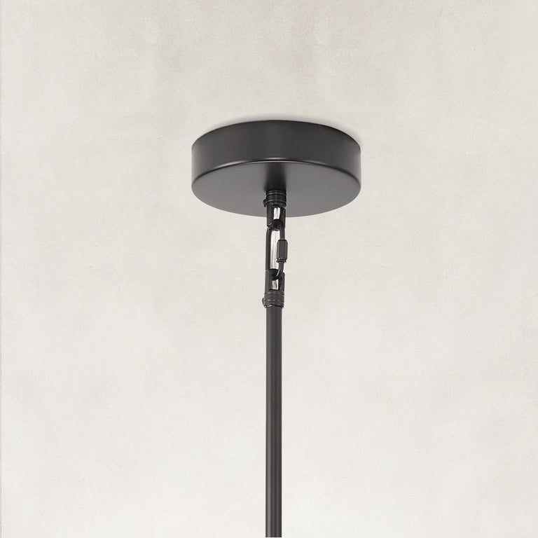 Black pendant canopy and rod connection.