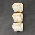 Blocco Alabaster Wall Sconce by Dalmivik, complete fixture illuminated