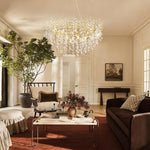 Brass branch crystal ring chandelier in a furnished interior