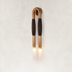 Brown U-shaped wall sconce with textured middle sections