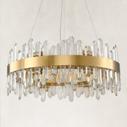 Brushed-brass ring chandelier with clear crystal prisms, fixture body detail