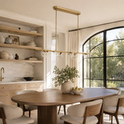 Bubble Glass Linear Island Chandelier in Aged Brass - interior setting